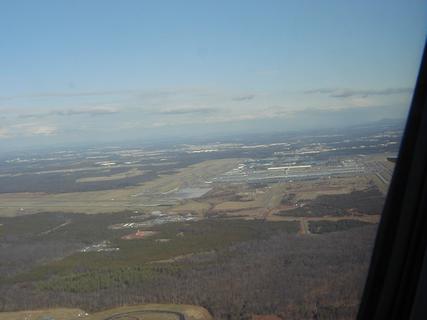 Dulles International Airport<br>Location: <a href="https://www.google.com/maps/search/?api=1&query=38.90294,-77.44441" target="_new">Over Virginia</a>